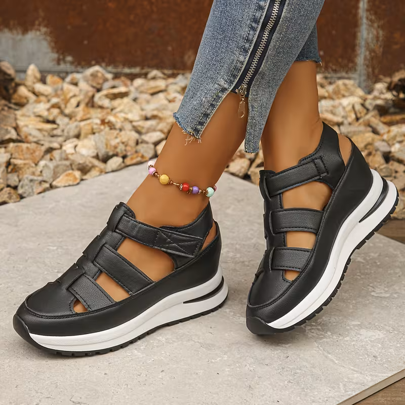 Hidden wedge sandal — sole profile showing concealed height construction