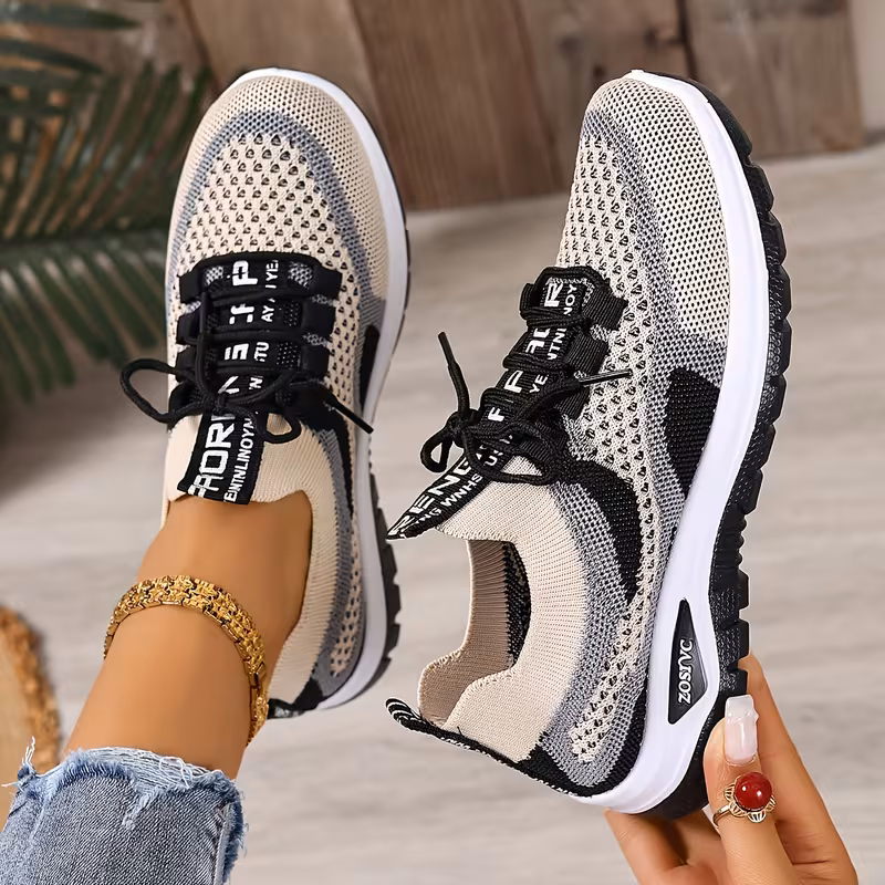 Women's Lightweight Breathable Sneaker top-down view showing lace-up detail and mesh upper texture