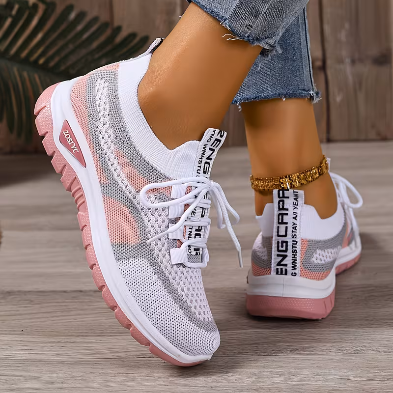 Women's Breathable Sneaker side profile showing low-top lace-up design and sole construction